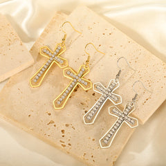 Beautiful key ring, necklace and earrings with a crucifix pendant made of zircon stones