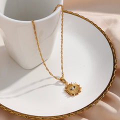 "Gold pendant necklaces."