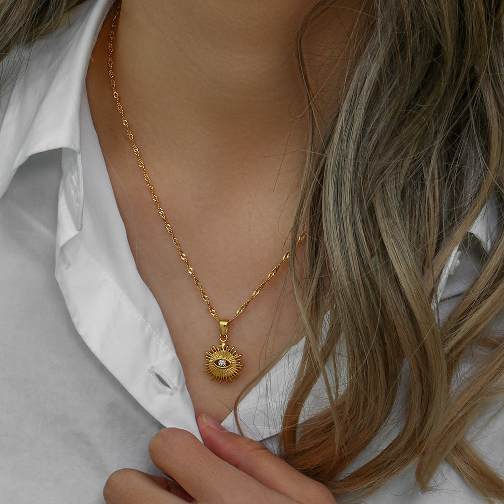 "Gold pendant necklaces."